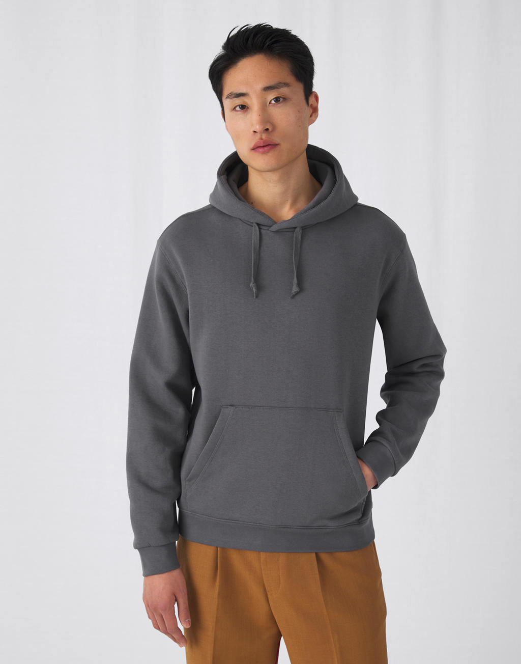 B&C Unisex Hooded Sweatshirt.